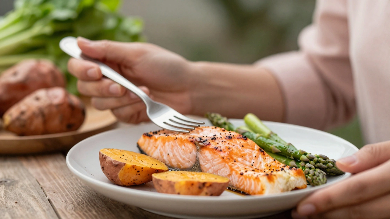 Hands holding fork over salmon and roasted vegetables